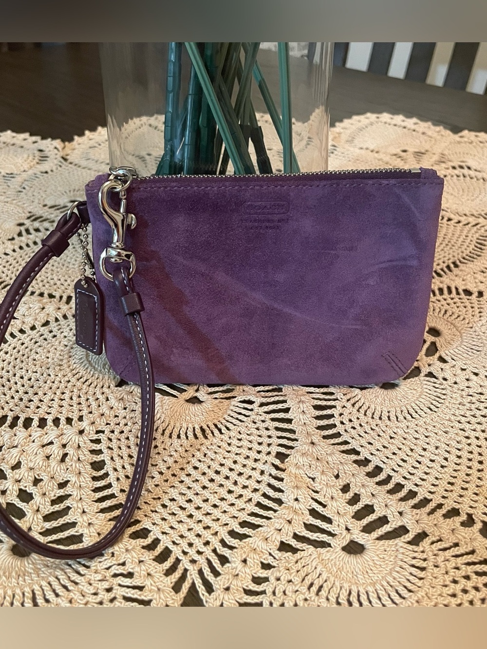 Y2K-era vintage Coach wristlet crafted from purple suede leather